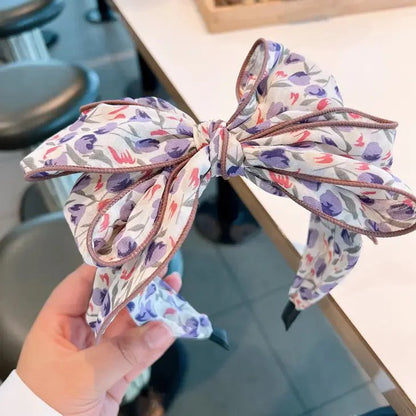 Large bow feathered floral headband Pink
